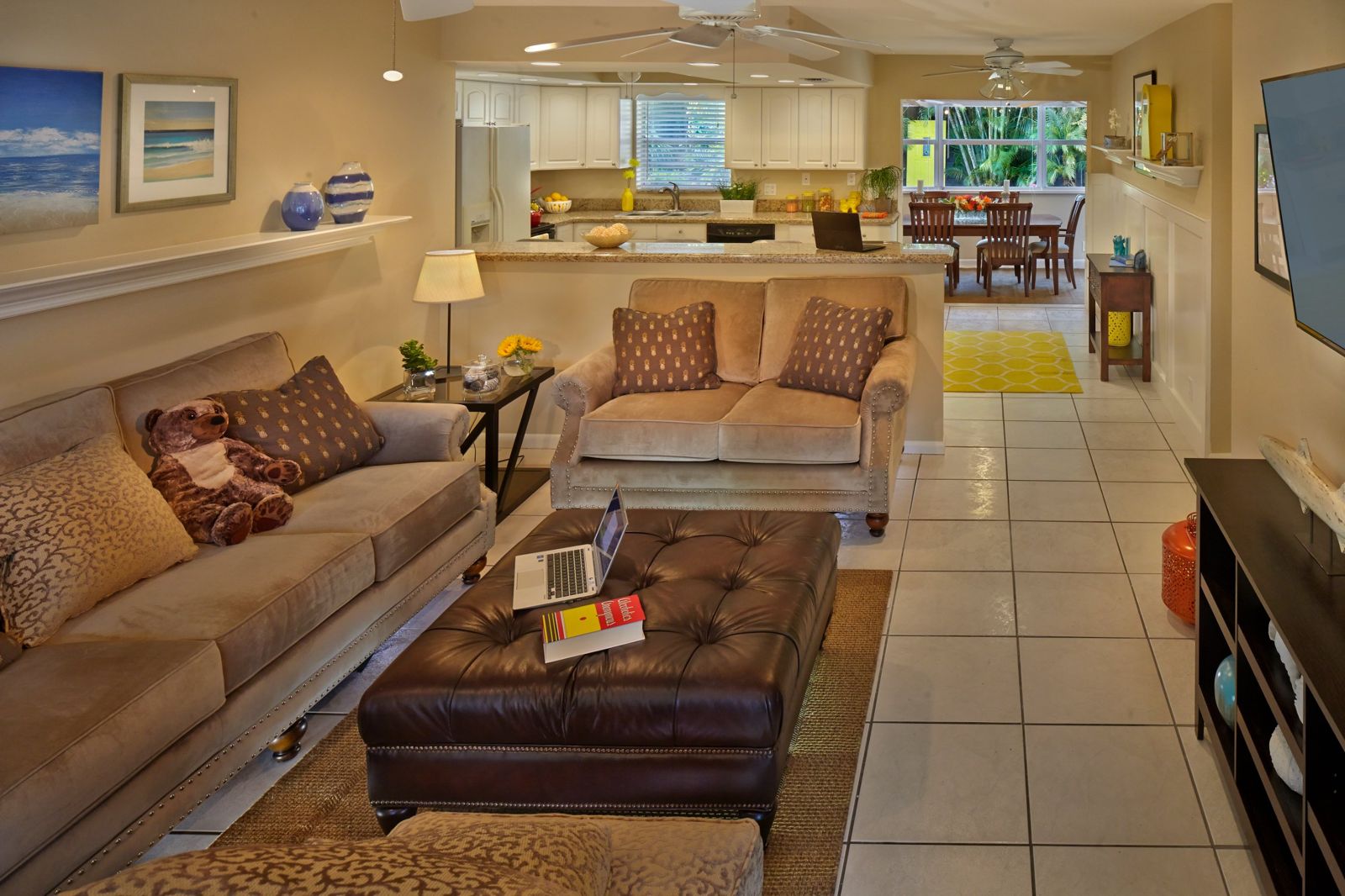 Open living room leading to the kitchen and dining area