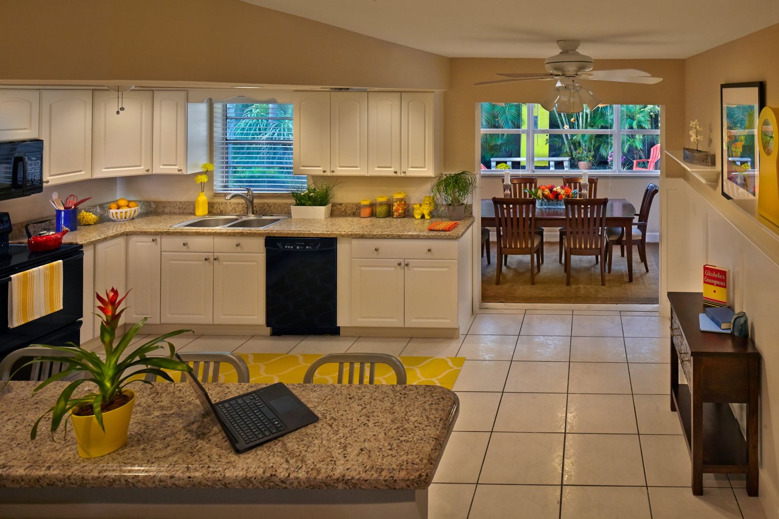 Kitchen with breakfast bar opening to the dining room